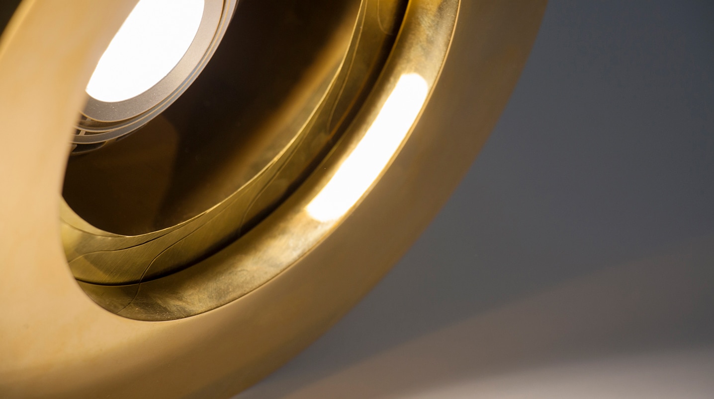 Iris cement and brass pendant lighting detail